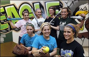 Clay looks to defend its City League title with, front from left, Ashley Cousino, Cassi Laberdee, and Kim Crawford, and back from left, Miranda Cortez, Kim Scharff, Brooke Thompson, and Danielle Holmes. The Eagles were 24-5, 11-0 in the CL last season and reached the Division I district final. 
