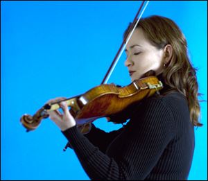 Toledo Symphony violinist Naomi Guy performs Sunday in the Toledo Club as part of the last concert in the Blade Chamber Series.