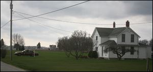 Ottawa County sheriff's deputies remained on scene mid-morning Saturday at the home on Leutz Road, northeast of Oak Harbor in Salem Township.