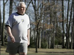Tom Pfau of Sylvania walks at Olander Park. He exercises daily to keep his Type 2 diabetes under control.