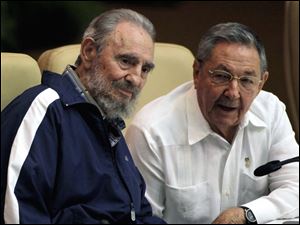 Fidel Castro makes a surprise appearance Tuesday at the 6th Communist Party Congress in Havana, Cuba. His brother Raul Castro, right,  was named first secretary of Cuba's Communist Party
