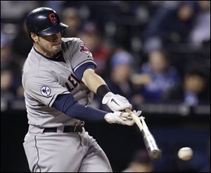 Cleveland's Matt LaPorta hits a broken bat single to score Michael Brantley during the seventh inning.