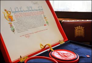 The Instrument of Consent issued by Queen Elizabeth II giving Prince William permission to marry Kate Middleton is on display at the Crown Office at the House of Lords in London. Under the Great Seal of the Realm, the queen signed the elaborate notice of approval consenting to the marriage, set for Westminster Abbey next week. 