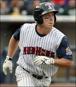 Toledo’s Andy Dirks watches his second home run of the night leave Fifth Third Field.
