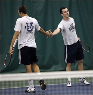 Seven Burus, left, was born in Croatia, while Aleksandar Elezovic grew up in Serbia. They are 30-8 record this season in doubles.