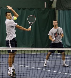 Sven Burus, left, was ranked among the top 15 junior tennis players in Croatia. Aleksandar Elezovic, who grew up in Belgrade, Serbia, transferred to UT from Georgia State in 2008.

