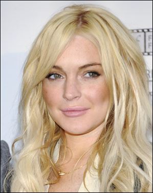 Lindsay Lohan poses during a news conference for her new film 