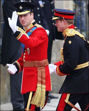 Prince William, left, arrives at Westminster Abbey accompanied by his brother, Prince Harry.