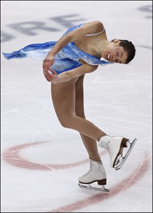 Alissa Czisny of Bowling Green competes in Saturday’s free skate portion of the world figure skating championship. Czisny, who is the U.S. champion, came into the night in fourth place, but her fifth-place finish in the free skate dropped her one spot.