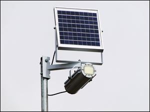 More than 160 radar devices at 84 locations, including this one on southbound I-75 near state Rt. 582 in Wood County, will transmit traffic data not only to the ODOT Web site, but to message boards at 11 key sites so drivers can be alert.