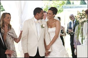 Laz Alonso, center left, and Paula Patton play lovers who come from two very different families who all come together for their wedding at Martha's Vineyard.
