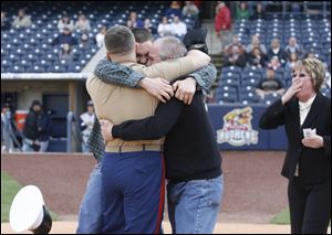 Joe Myers, left, older brother Jake Myers, father Joseph Myers, and mother Elizabeth Myers, all of Toledo. 