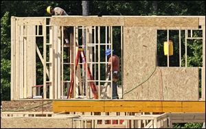 Construction of new U.S. homes dipped slightly last month, missing expectations, in a sign that the building industry's recovery from the housing bust is likely to be bumpy and gradual.