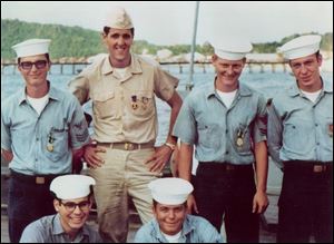Democratic presidential candiae John Kerry is with his shipmates in 1969. As a Navy lieutenant, Mr. Kerry skippered a 'Swift' boat that patrolled the Mekong River.