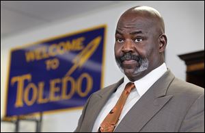 Mayor Mike Bell imposed the concessions under 'exigent circumstances' last year. 