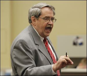 John Weglian of the prosecutor's office makes an opening statement.