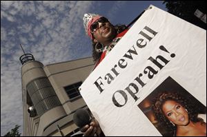 Kimberly Adams of Chicago stands outside Harpo Studios before the final taping of 