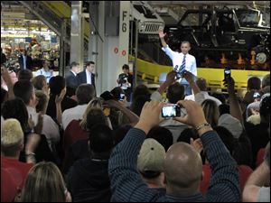 President Obama addresses a crowd of about 350 auto workers and dignitaries during a visit to Chrysler’s Toledo Assembly complex. He credited Toledo for showing that American workers are a good bet.