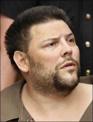 Geoffrey Dupuis is arraigned in Toledo Municipal Court Monday.