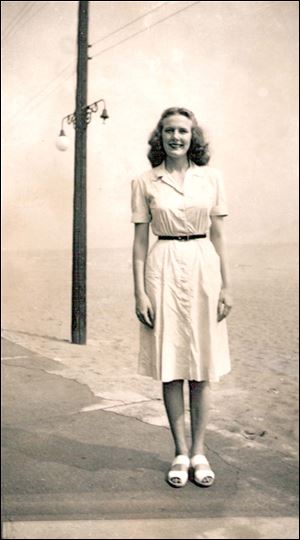 Genevieve 'Jean' Wolfe paused for a photo along the shore of Lake Erie in 1944 during Land Camp.