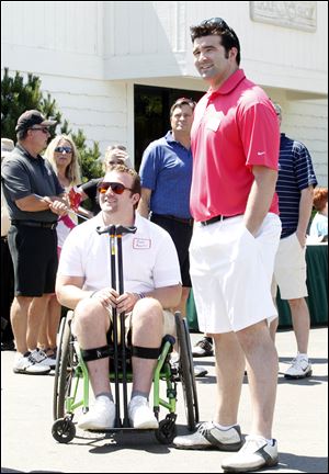 Brothers Brock Mealer, left, and Blake Mealer get ready for the David Mealer Memorial Golf Classic at Brandywine.