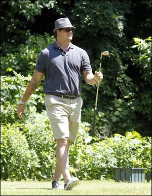 Taylor Lewan was one of 32 Wolverines helping at the 2nd annual event.