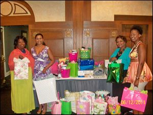 From left, Richelle Watkins, Olla Danielle Goodwin, Clara Petty, and Erin Baker at the 'In Her Shoes' luncheon hosted by Alpha Kappa Alpha Sorority Inc.