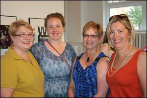 Barb and Jen Christensen, Margo Leininger, and TSA gallery director Leslie Taylor.
