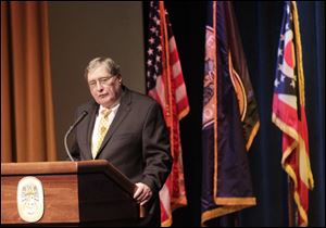 UT President Lloyd Jacob is paid $392,700 a year.