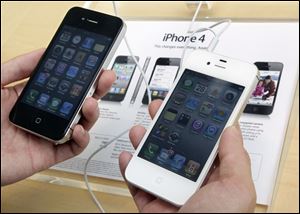 The new iPhone will have an A5 processor and an enhanced camera, sources say.