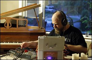 Jason Soliday of Chicago is one of many avant-garde musicians who perform at the house.