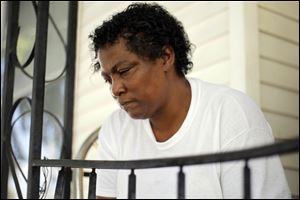 Rosie Phillips, the mother of slain teen Marquan McCuin, 18, tears up as she describes her son.