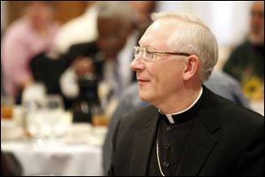 Toledo Bishop Leonard Blair is introduced to the crowd before speaking at a luncheon on 