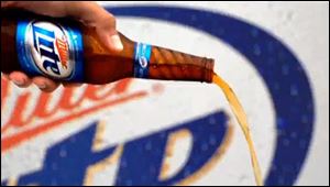 The 'Vortex' bottle created by Owens-Illinois Inc. lets beer spiral into the glass.