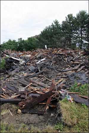A fire on 16th Street destroyed an abandoned 14-unit apartment complex Friday. Officials have called it arson.