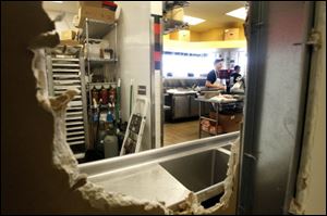 Thieves broke through a wall between the Verizon store and Jimmy John's restaurant in the shopping strip on Glendale Avenue across from Walmart. They apparently stayed in the back parts of the stores.