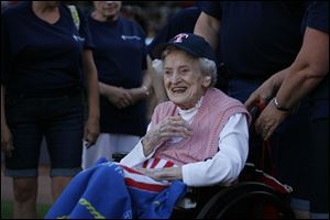 Freda Sackett, 101, enjoys her chance to sing the 'Star-Spangled Banner' with St. Paul Lutheran Church choir.