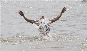 Toledoan Aaron Imber finds relief from the heat at Maumee Bay State Park.
