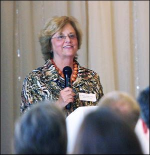 Mary Ellen Mazey, who took over the presidency of Bowling Green State University July 1, addresses businessmen at the Bowling Green Chamber of Commerce at Stone Ridge Golf Club. She's already met with local economic development officials and Toledo Mayor Mike Bell, sampled the parks and golf courses, and has gotten to know the police pretty well, Ms. Mazey joked.