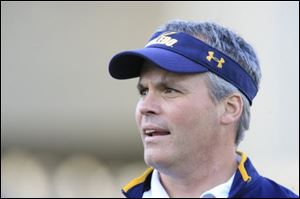 In 2 years Tim Beckman, shown at spring game, helped UT improve on field and classroom.