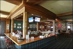 The mixed grill features a sunken bar and walls filled with history.  