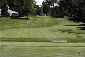 The creek and the winding fairway lead to an elevated green at No. 16, considered one of  America's top par 4s.
