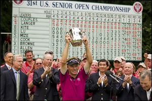 Bernhard Langer lifts the trophy after winning the U.S. Senior Open Championship last year at Sahalee Country Club in Sammamish, Wash. He also won the Senior British Open in 2010.