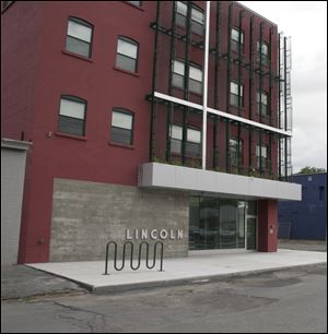 The building at 109 Otisco St. in Syracuse, N.Y., was given to the Say Yes program for use as office
space by Syracuse University. The site, a block from
public housing, was judged as perfect to build a relationship with the community the program serves.
The program
hopes to raise the
city’s graduation
rate to nearly 100
percent, then pay
for the graduates
to go to college.