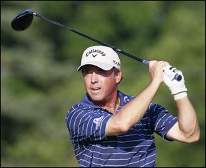 Olin Browne tees off on #9 during the first round of the U.S. Senior Open Thursday. Browne finished at 7 under as the leader.