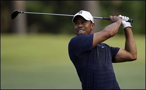 Tiger Woods will emerge from the third-longest layoff of his career when he plays next week at the Bridgestone Invitational. Caddying for him will be Byron Bell, a close friend and business associate.