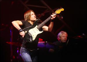 Keith Urban performs at Huntington Center on Friday.