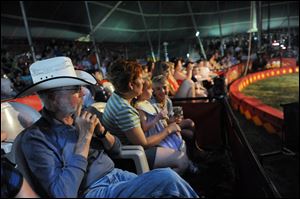 John Ringling North II watches a circus performance.