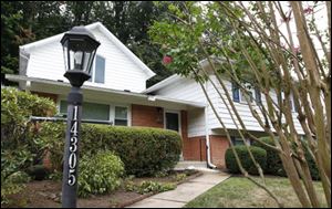 The home of kidnapped American development expert Warren Weinstein is seen in Rockville, Md., Saturday. Gunmen kidnapped Weinstein from his house in Lahore, Pakistan, Saturday after tricking his guards and breaking into the house in a brazen raid that alarmed aid workers, diplomats and other foreigners, who already tread carefully in this country rife with Islamic militancy and anti-U.S. sentiment.