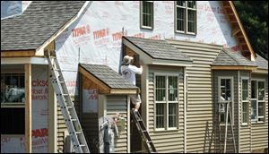 Builders broke ground on fewer single-family houses in July, leaving home construction at depressed levels.